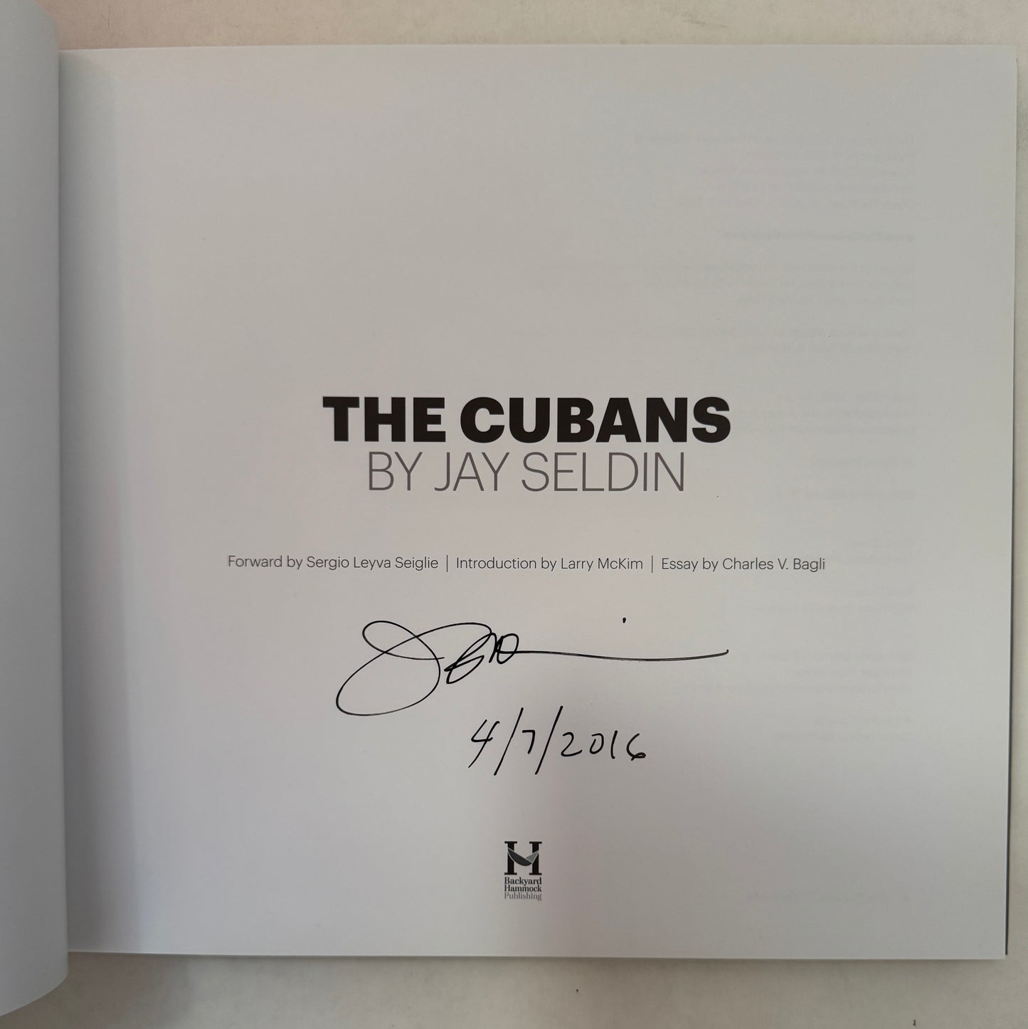 The Cubans [signed]