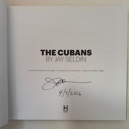 The Cubans [signed]