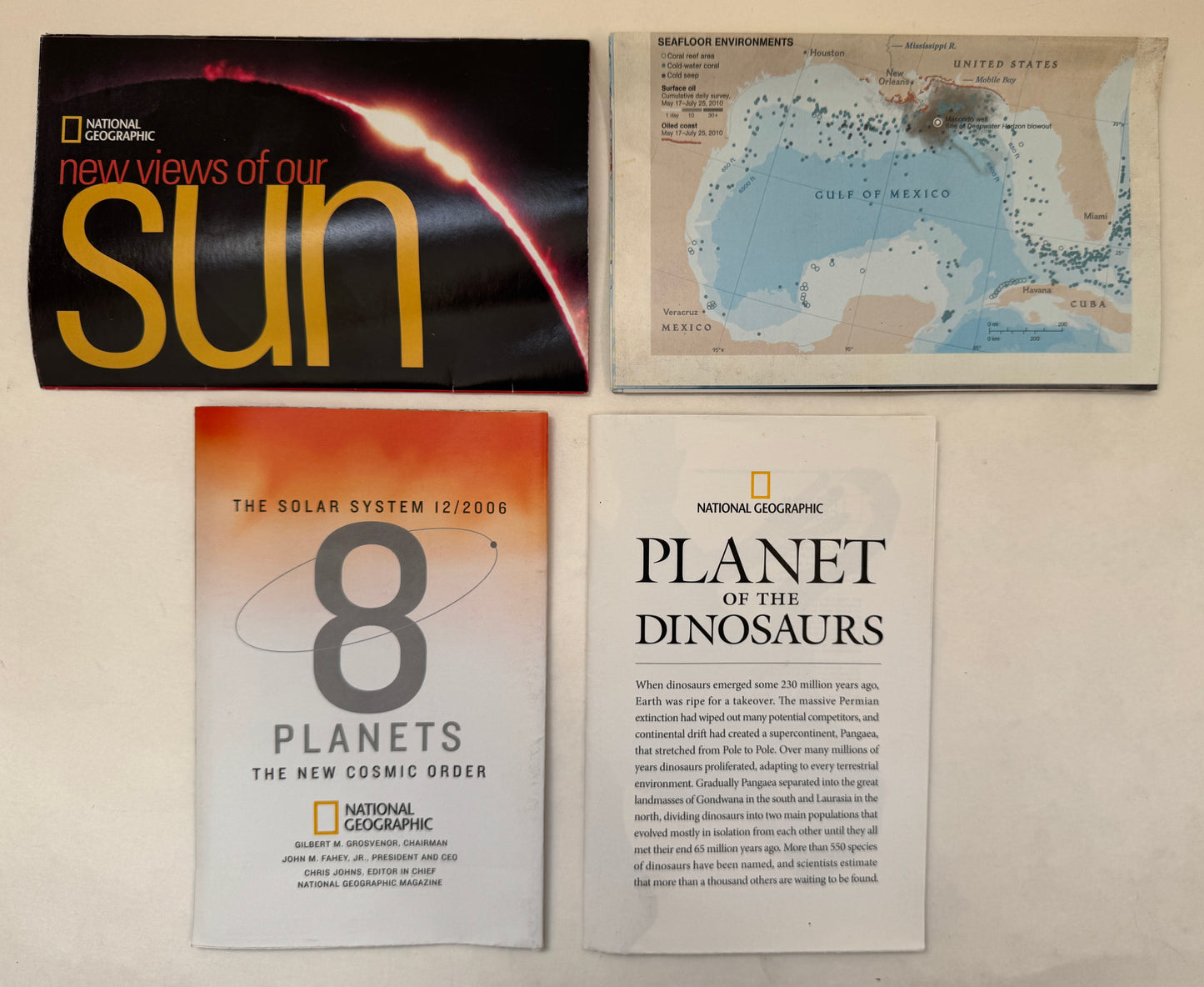 [Set of 4 Maps]: New Views of Our Sun; the Solar System 12/2006: 8 Planets the New Cosmic Order; the Gulf of Mexico: Layers of Life; Planet of the Dinosaurs
