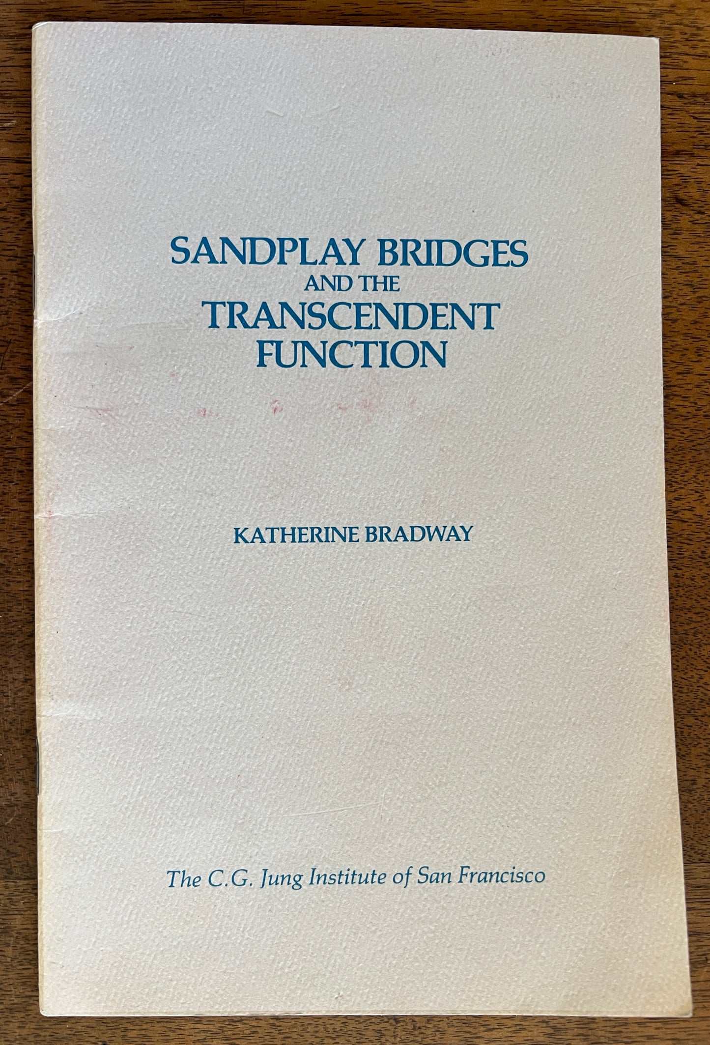 Sandplay Bridges and Transcendent Function